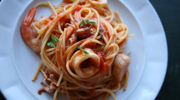 Shrimp, Calamari,  & Scallops over Spaghetti